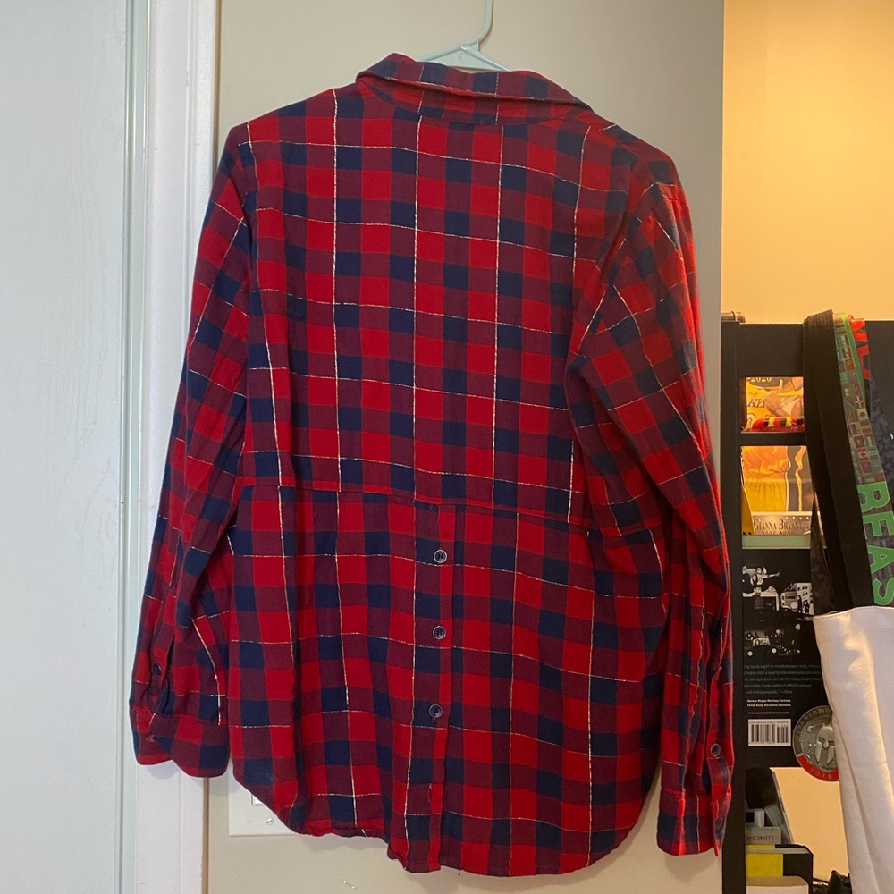 Red and blue longsleeve button down flannel.